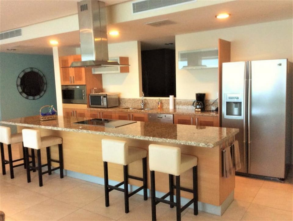 Comfort Condo, Kitchen, Ocean View | Private kitchen | Fridge, microwave, cookware/dishes/utensils