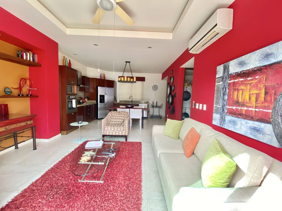 Comfort Condo, Kitchen, Ocean View | Living area | Flat-screen TV