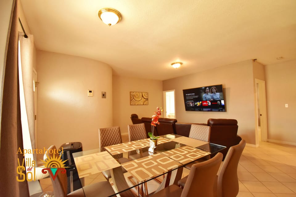 Luxury Suite, 3 Bedrooms | Living area | 65-inch Smart TV with satellite channels, TV, Netflix