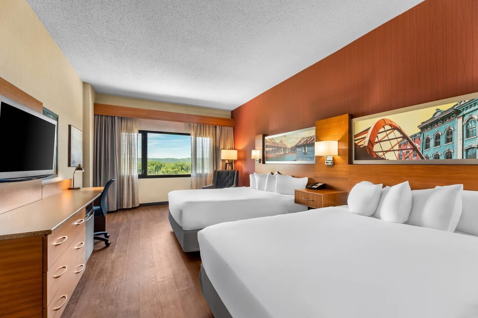 Room, 2 Queen Beds, Non Smoking, River View | Pillowtop beds, desk, laptop workspace, blackout drapes