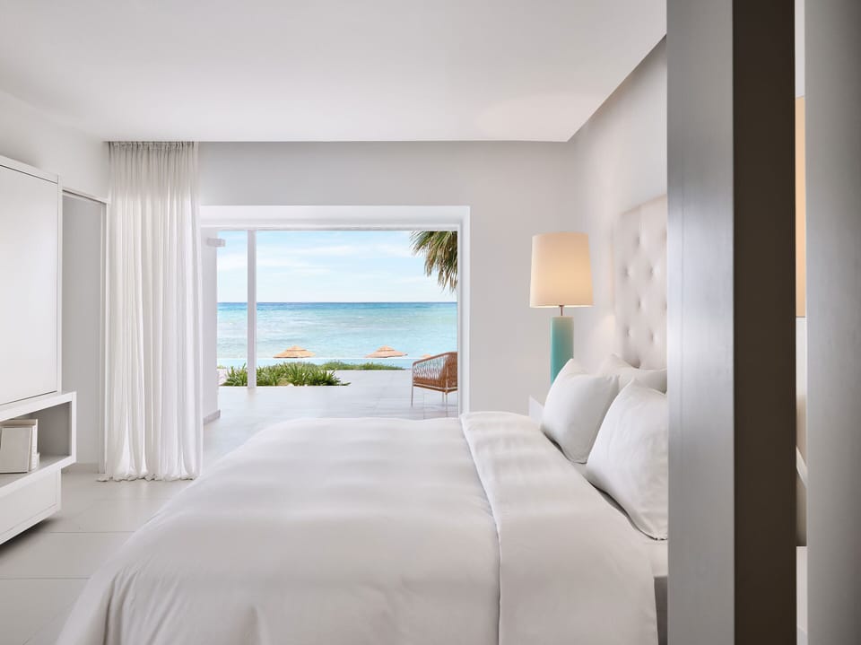 Yali Seafront Suite with Sharing Pool | Free minibar, in-room safe, blackout drapes, free WiFi