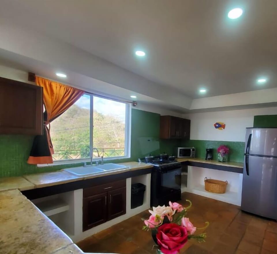 Villa | Private kitchen | Coffee/tea maker, full-size fridge, microwave, cookware/dishes/utensils