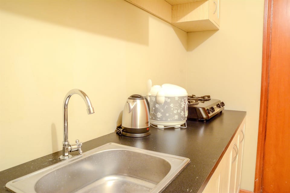 Standard Apartment, 3 Bedrooms | Private kitchenette | Fridge, stovetop, electric kettle, rice cooker