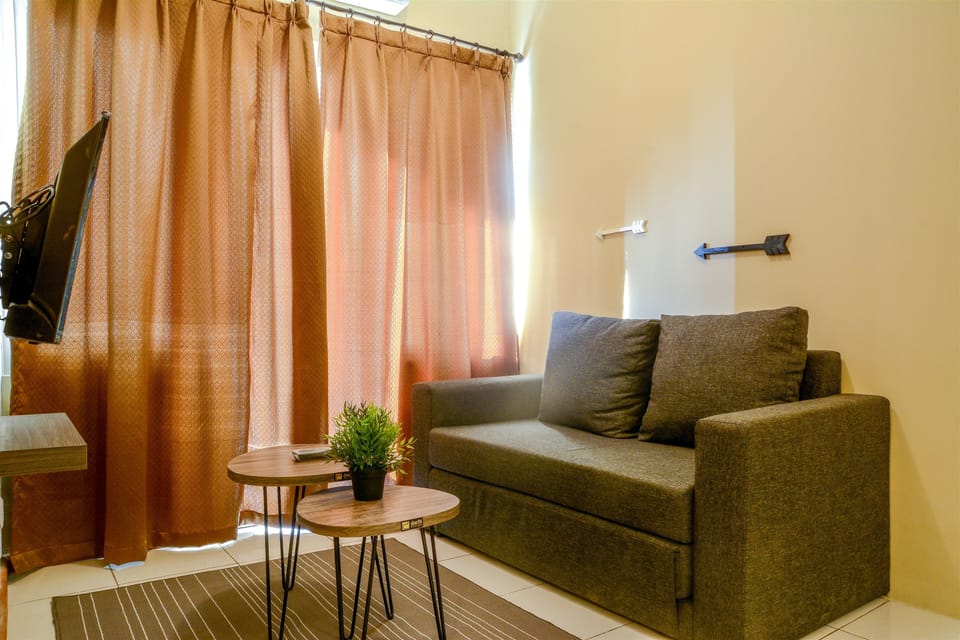Standard Apartment, 3 Bedrooms | Living room | Flat-screen TV