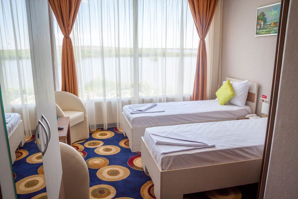 Double or Twin Room | In-room safe, iron/ironing board (on request), WiFi (free), bed sheets