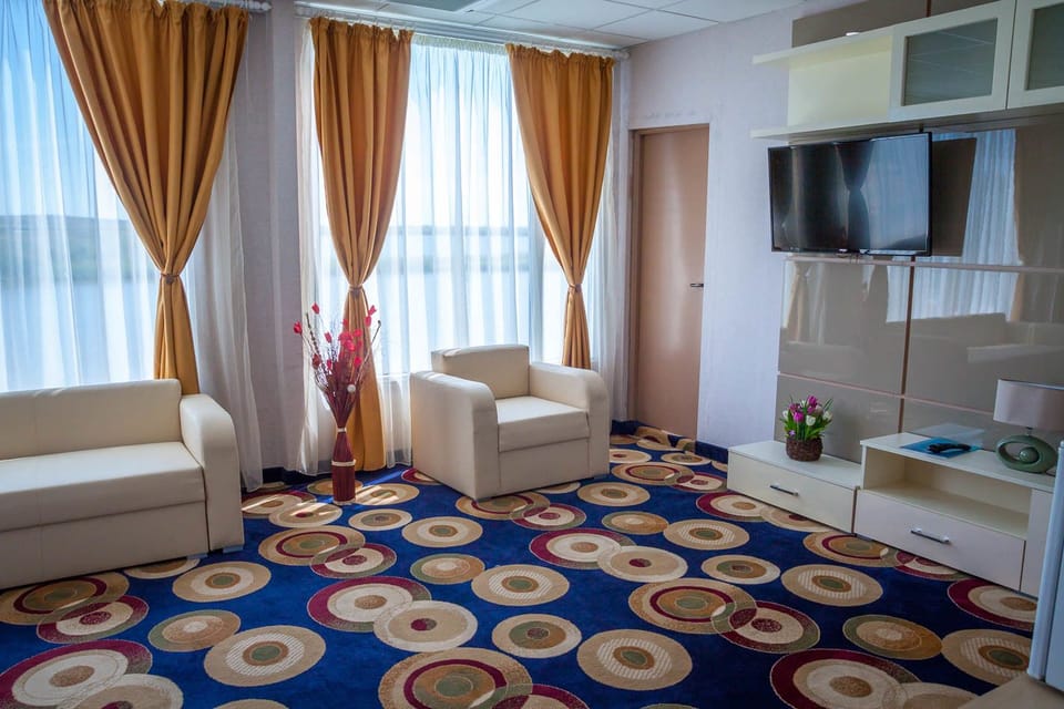 Apartment (VIP) | Living area | Flat-screen TV