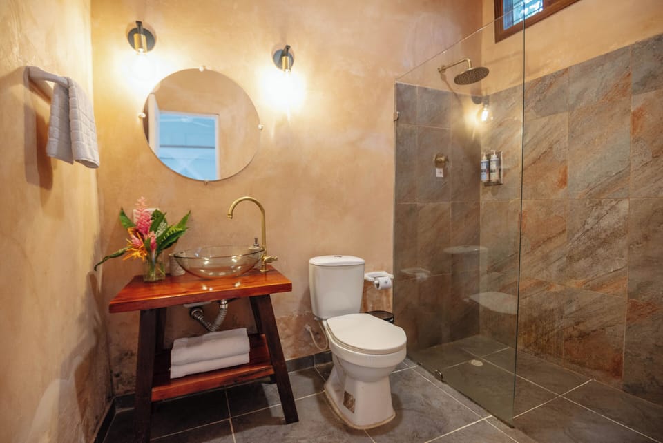 Family Quadruple Room, Multiple Beds, Garden View | Bathroom | Shower, hair dryer, towels, soap
