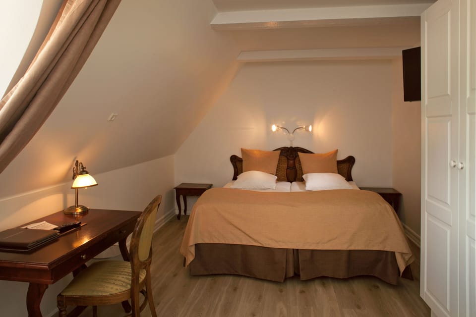 Minibar, desk, blackout drapes, iron/ironing board