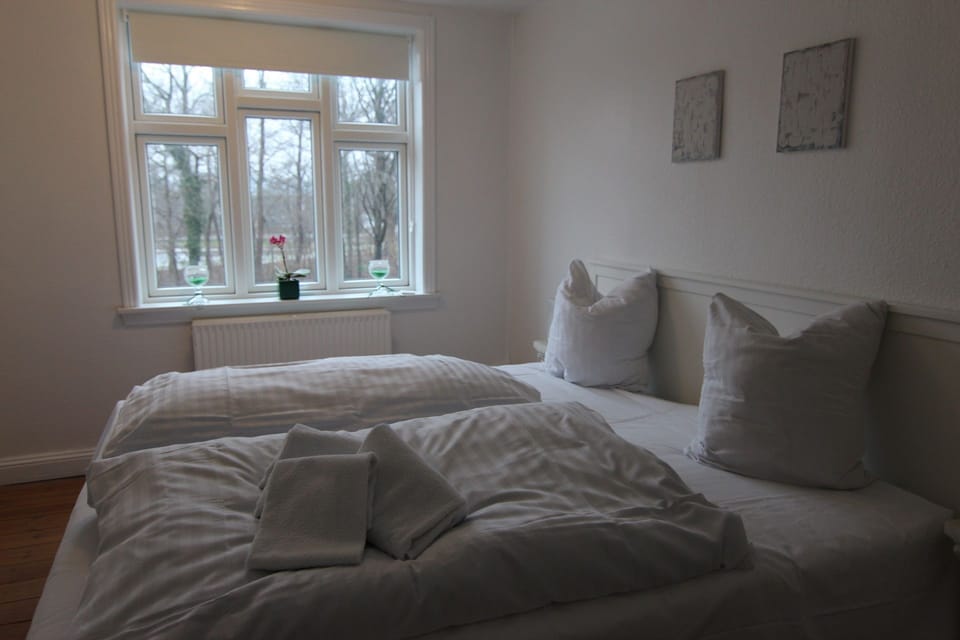 Standard Double Room, Shared Bathroom | Minibar, blackout drapes, iron/ironing board, free WiFi