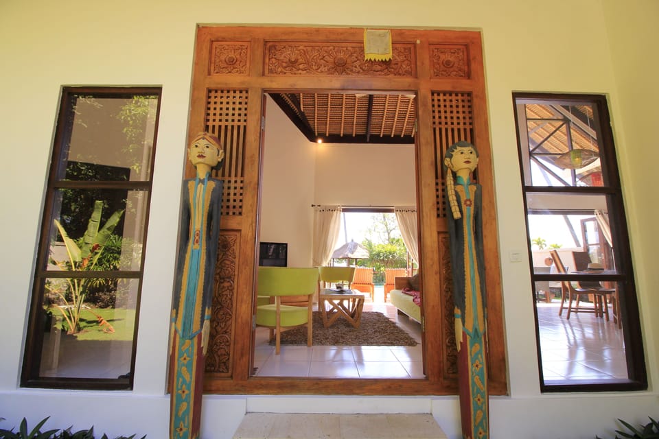 Deluxe Villa, 4 Bedrooms | Living area | Flat-screen TV, DVD player