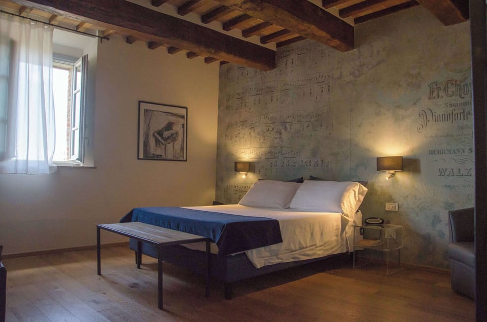 Deluxe Room, Multiple Beds, Non Smoking | In-room safe, individually decorated, desk, blackout drapes