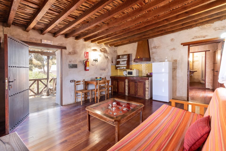 Cottage, 1 Bedroom (Amanay) | Living area | 15-inch flat-screen TV with cable channels, TV