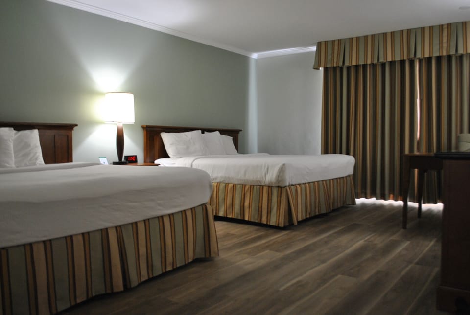 Executive Room, 2 Queen Beds, Non Smoking | Desk, laptop workspace, blackout drapes, iron/ironing board