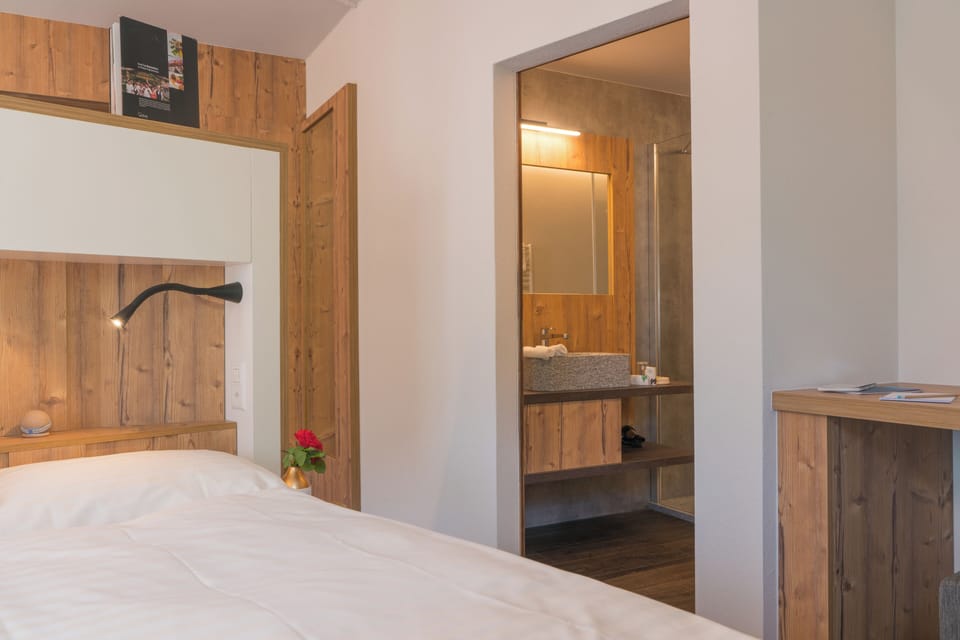 Premium bedding, down comforters, in-room safe, desk