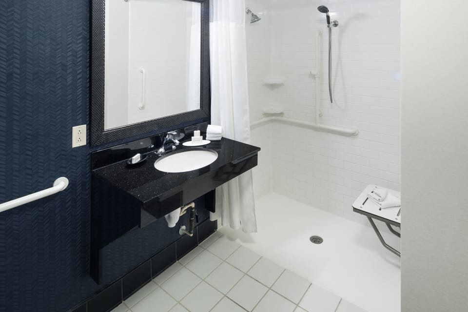 Combined shower/tub, eco-friendly toiletries, hair dryer, towels