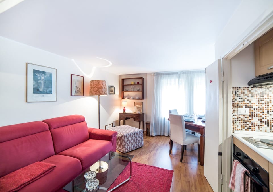 Standard Duplex, 1 Bedroom | Living area | Flat-screen TV