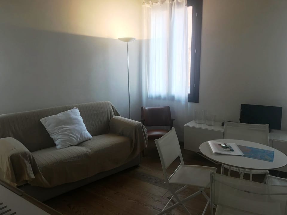 Apartment, 1 Bedroom | Living area | Flat-screen TV