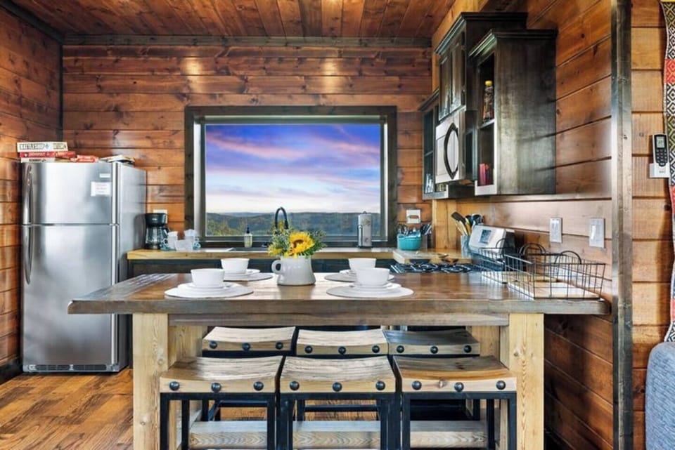 Make your way into the fully stocked kitchen or sit at the bar