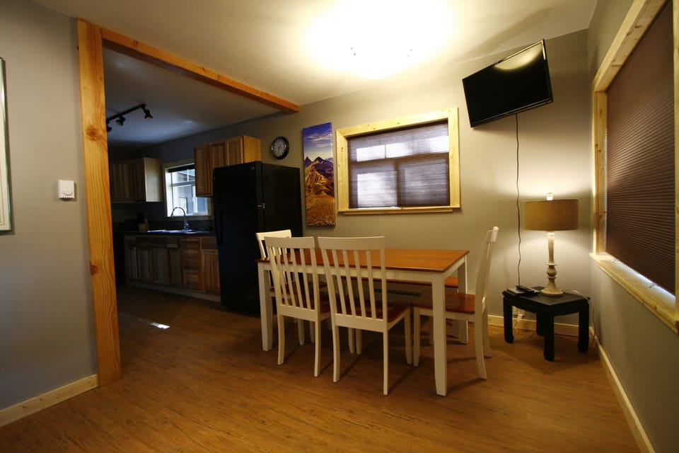 dining area adjacent to living room and kitchen