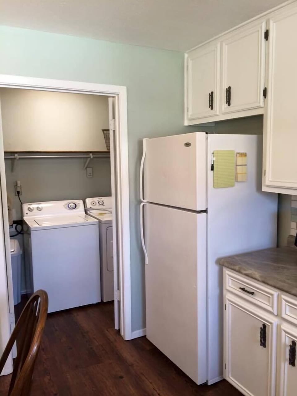 Washer and dryer right off kitchen.  Detergent provided.
