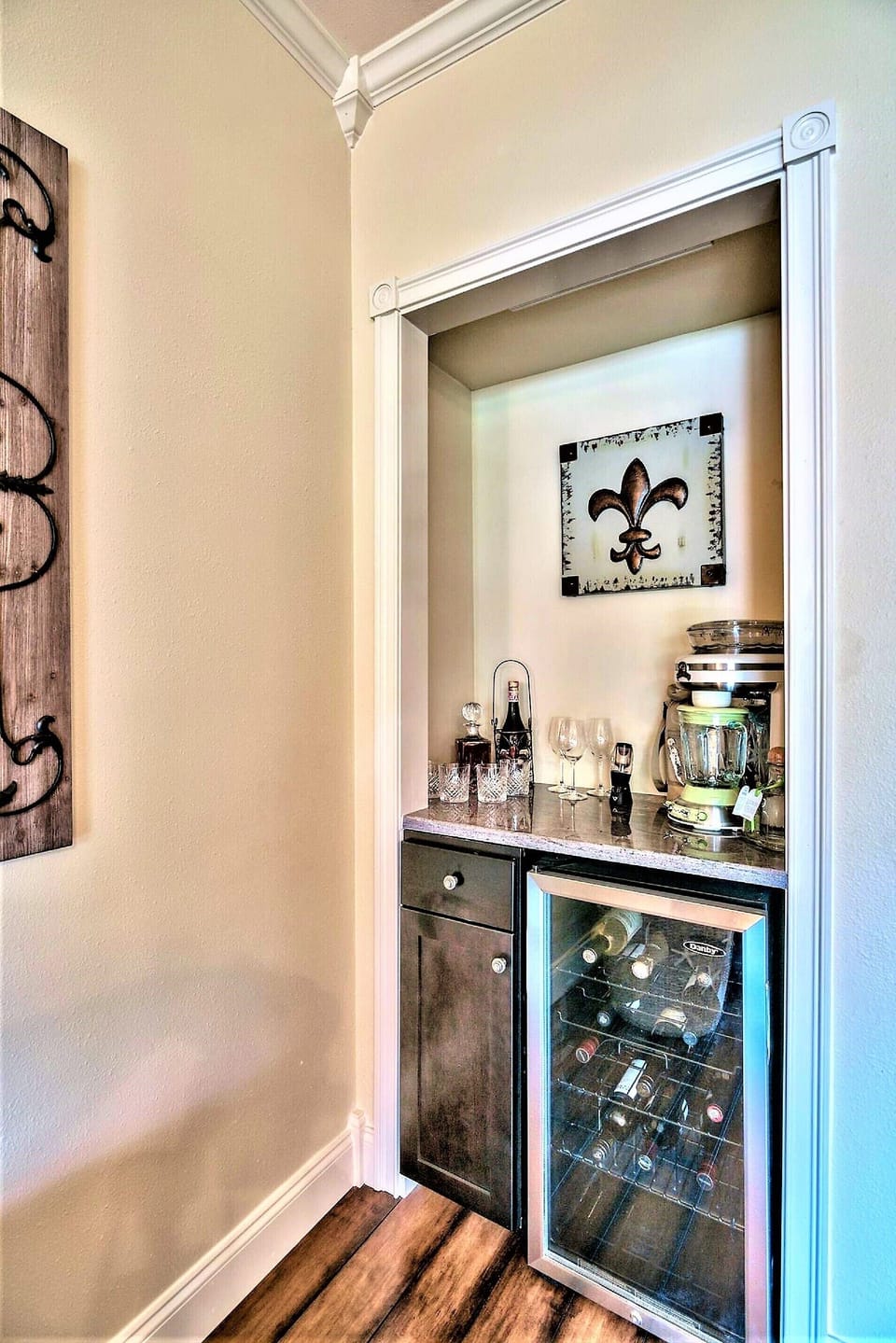 ENJOY THE WET BAR COMPLETE WITH WINE COOLER
