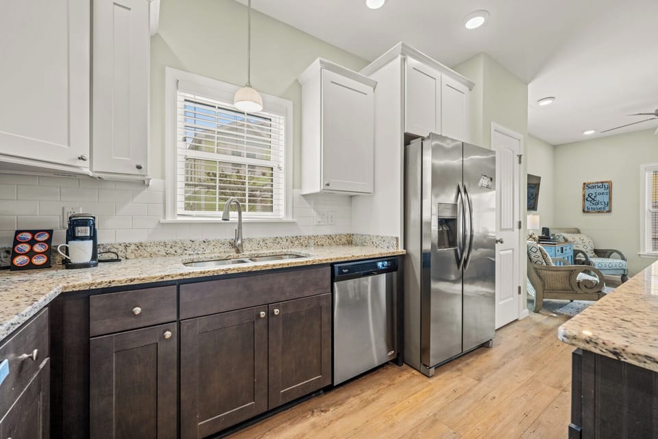 Kitchen with Bar Seating on First Level