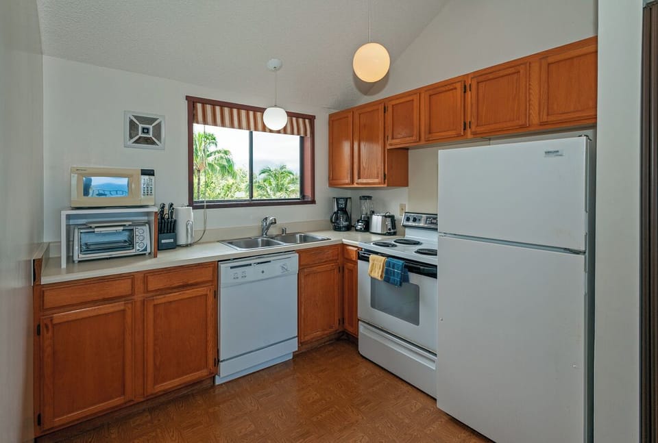 Sealodge F9 | Princeville vacation rentals at Sealodge Kauai 9 - Sealodge F9 | Princeville vacation rentals at Sealodge Kauai | The full kitchen offers all the amenities of home