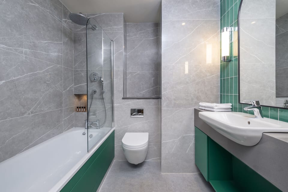 Hair dryer, towels, soap, shampoo