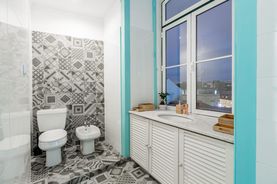 Deluxe Quadruple Room with private toilet | Bathroom | Hair dryer, towels