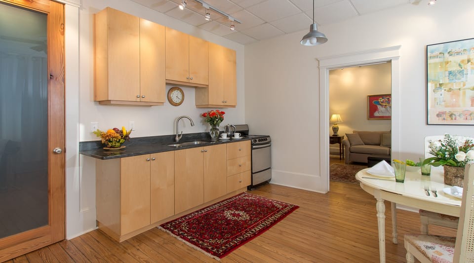 Kitchen/dining. Oval table seats 4. Well stocked. Sunsets