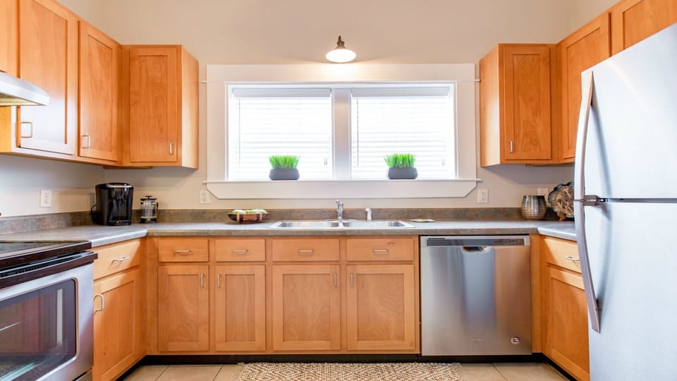 Kitchen is well appointed with new appliances.