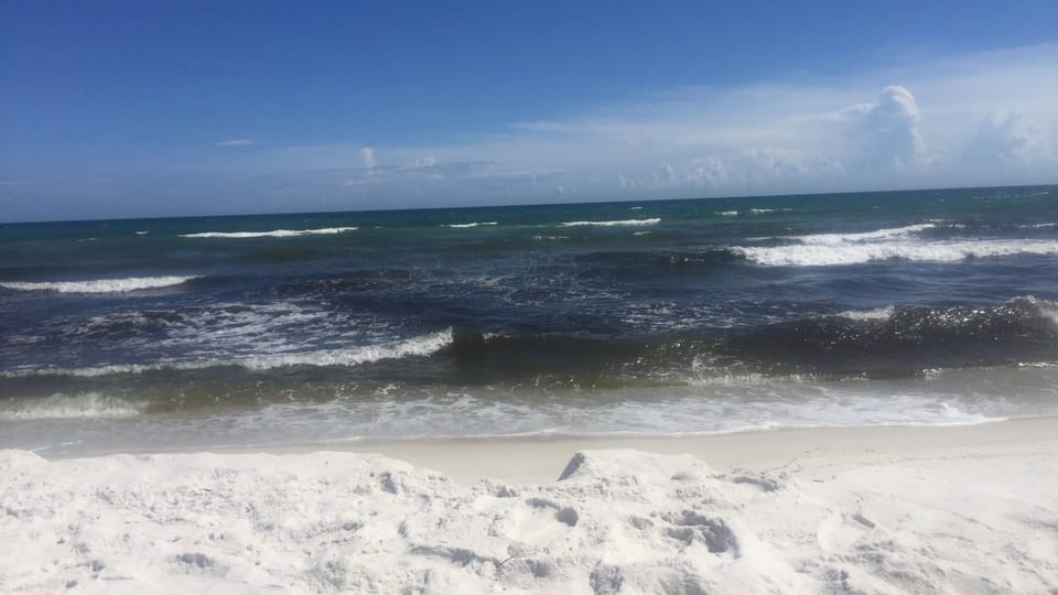 Nearby Beach with White Sand and Emerald Water