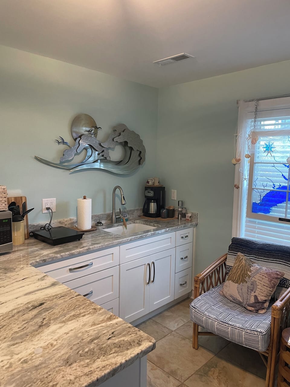 first floor 1/2 kitchen and pool access; 1/2 bath