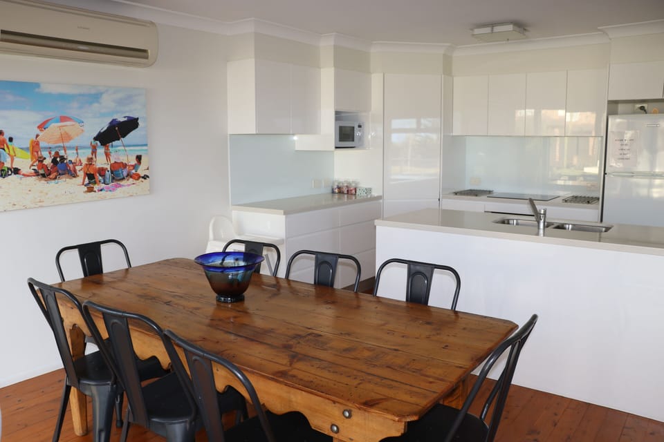 Modern Kitchen with gourmet potential and sitting for 8.