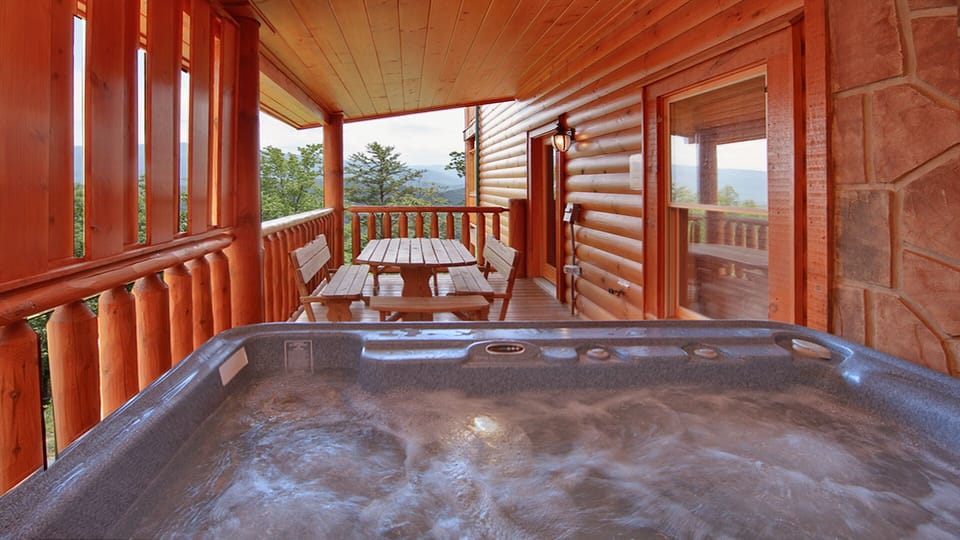 Lowest floor, Private Hot Tub with seating area and mountain views