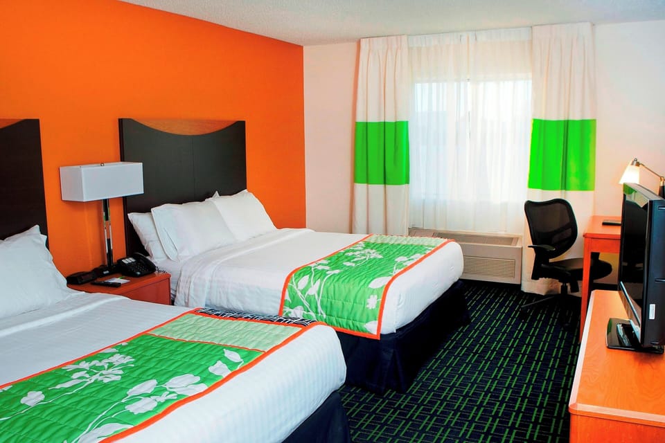 Room, 2 Queen Beds | Pillowtop beds, desk, blackout drapes, iron/ironing board