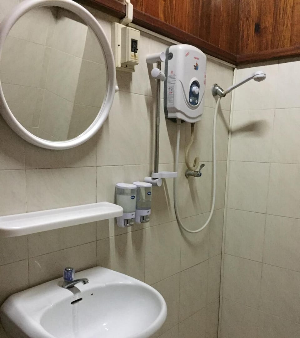 Shower, free toiletries, slippers, towels