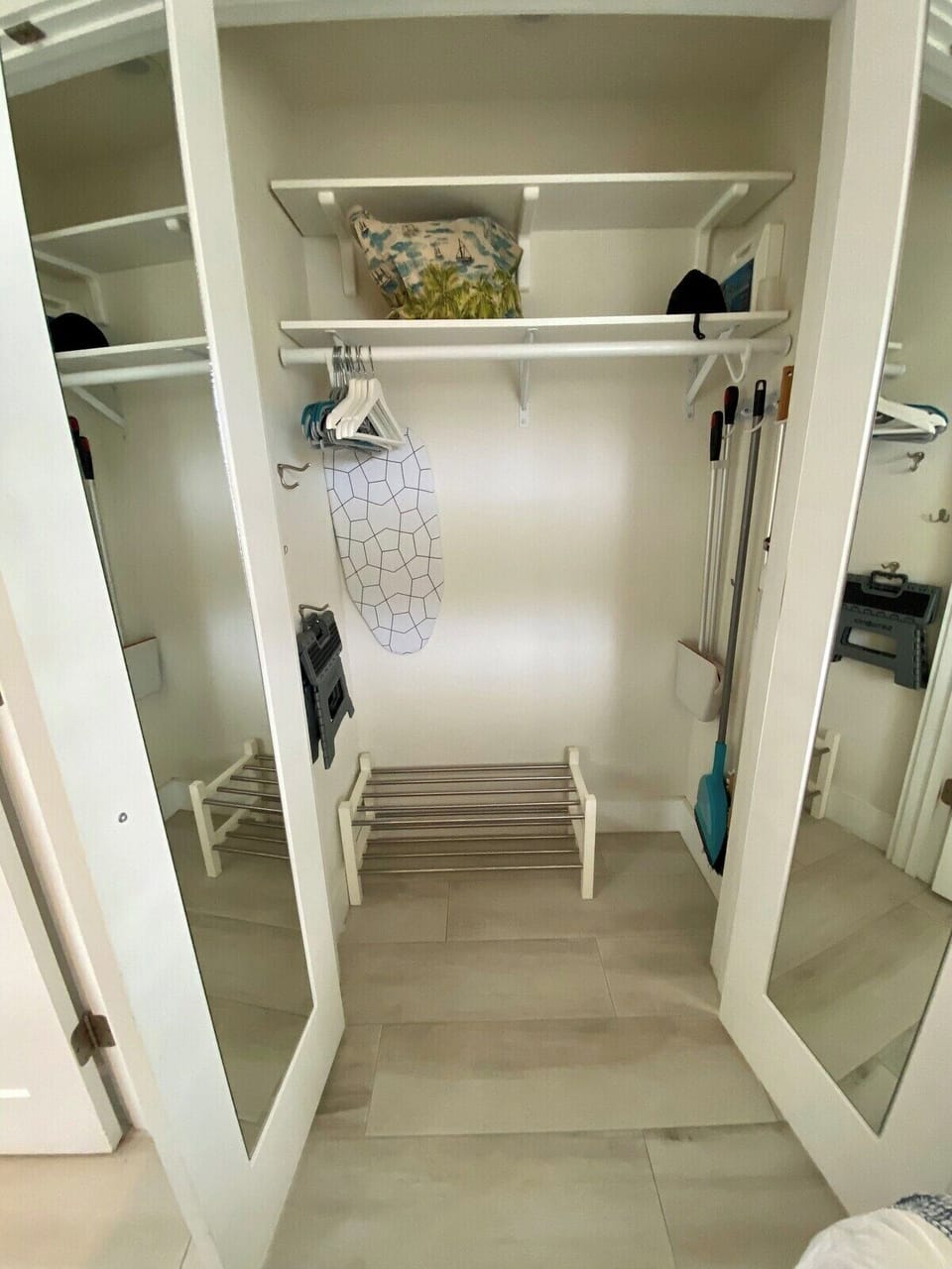 Spacious closet with beach bag and towels!