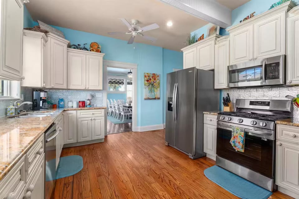 The kitchen looks into the dining room. It has everything you may need