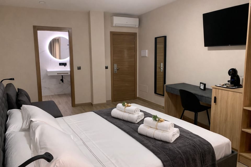 Family Triple Room | Premium bedding, down comforters, memory foam beds, minibar