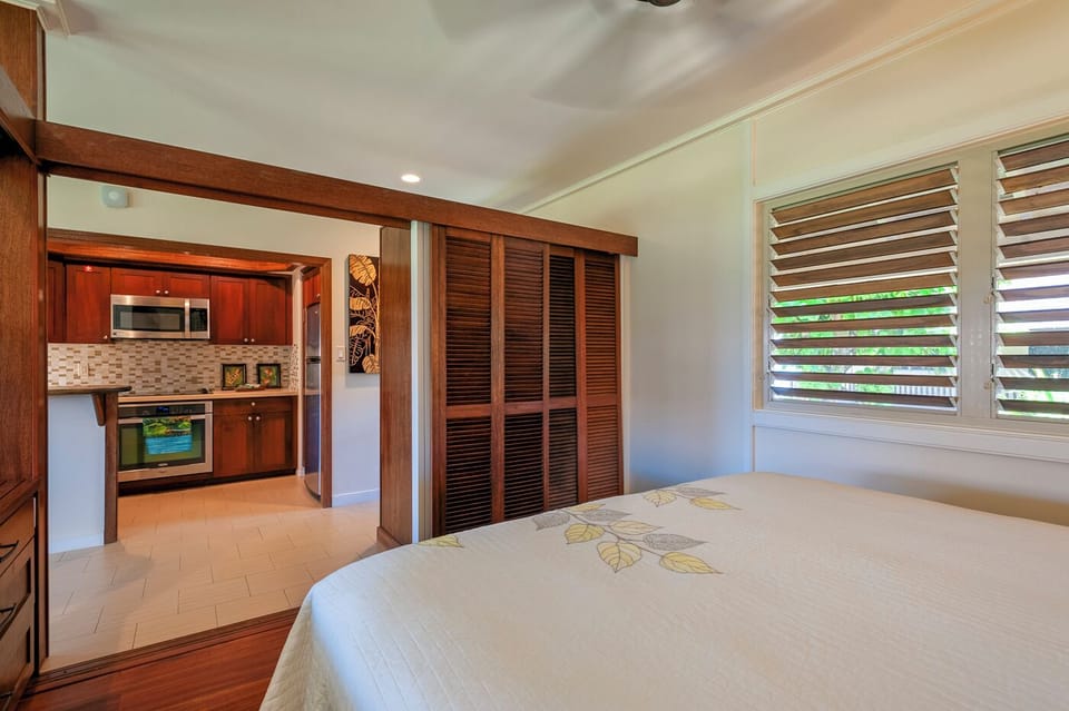 Hanalei Colony E3 Condo - Bedroom and kitchen.