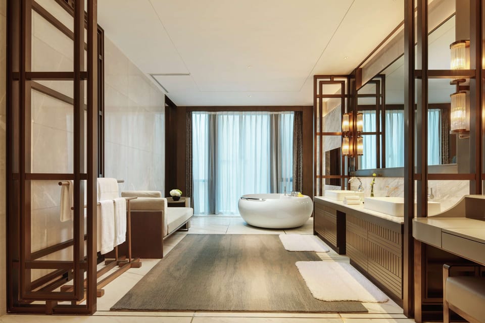 Presidential Suite, 1 Bedroom | Bathroom | Separate tub and shower, rainfall showerhead, designer toiletries
