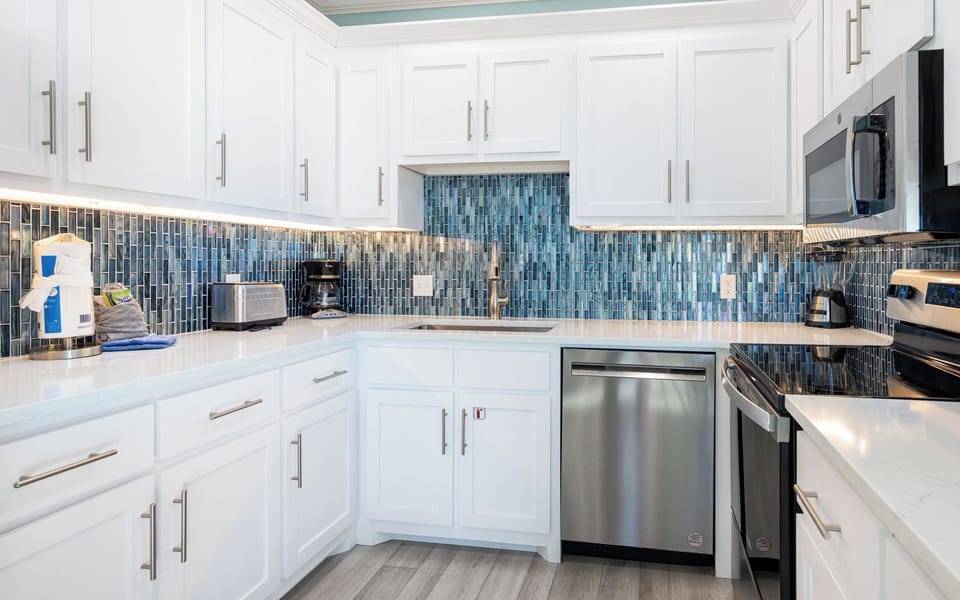 The aroma of coffee fills your kitchen while the family prepares for a fun beach day
