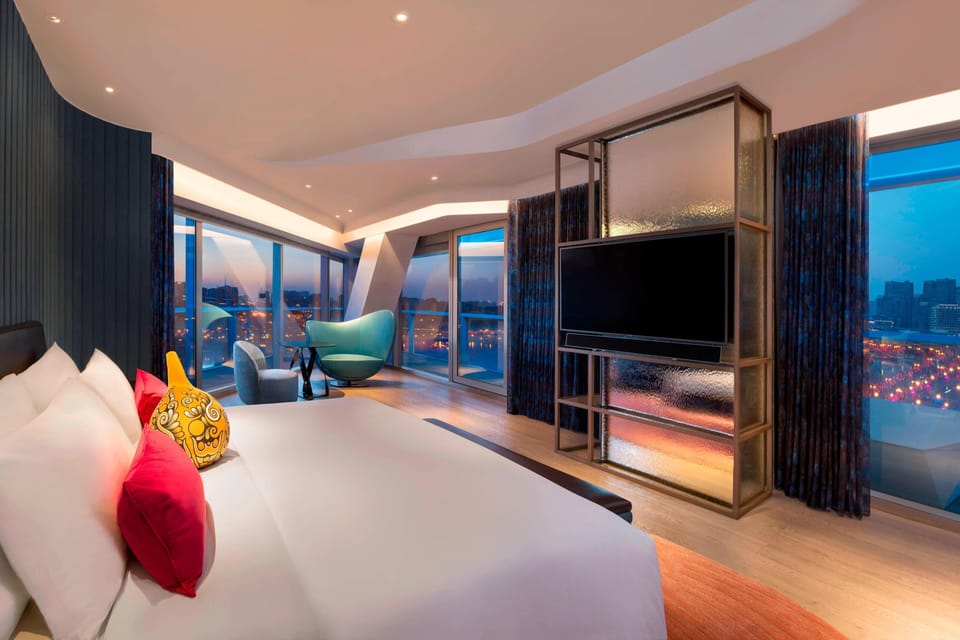 Suite, 1 Bedroom, Lake View | Hypo-allergenic bedding available, down comforters, minibar