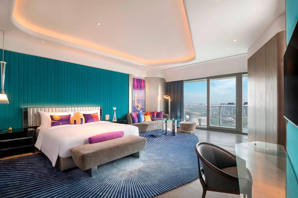Spectacular Suite, Suite, 1 Bedroom, Lake View | Hypo-allergenic bedding available, down comforters, minibar