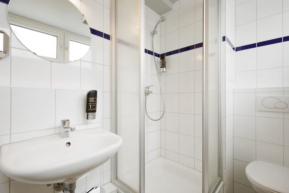 Shower, eco-friendly toiletries, hair dryer, soap