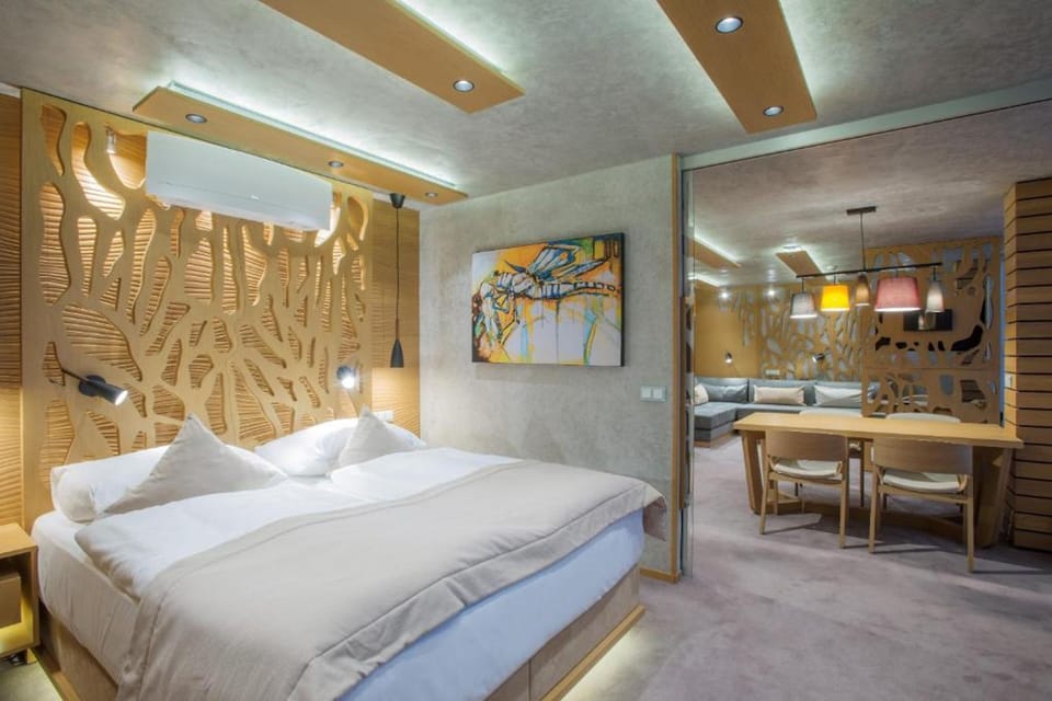 Panoramic Apartment (Unlimited Water and sauna world Acc.) | Minibar, in-room safe, desk, blackout drapes