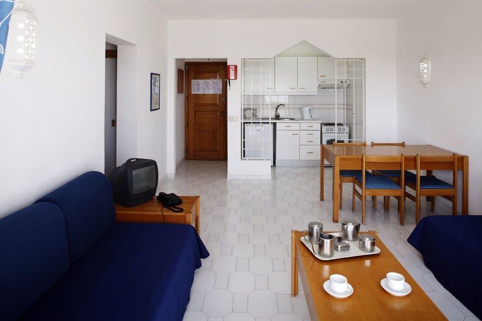 Apartment, 2 Bedrooms | Living area | 28-inch TV with cable channels