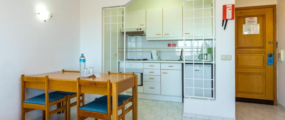 Full-size fridge, microwave, stovetop, electric kettle