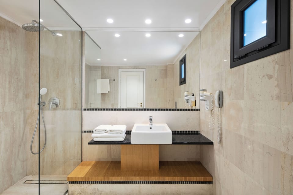 Family Room, Sea View | Bathroom | Free toiletries, hair dryer, bathrobes, slippers